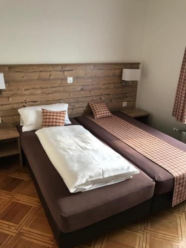 
Ein Bett oder Betten in einem Zimmer der Unterkunft Gasthaus Hämikerberg

