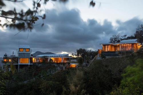 a house sitting on top of a hill at Seven Havens Residence in Selong Belanak