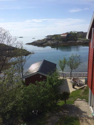 a house with a view of a body of water at Lofot Loftet in Svolvær