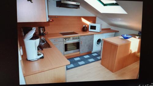 Η κουζίνα ή μικρή κουζίνα στο Ferienwohnung Berger Kurparkresidenz