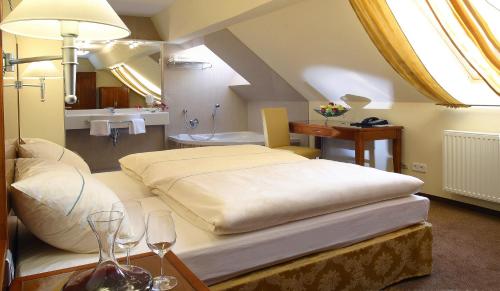 Ένα ή περισσότερα κρεβάτια σε δωμάτιο στο Hotel Nationalpark