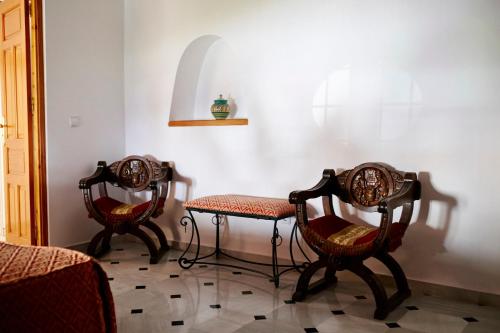 Area tempat duduk di Hotel Casa de los Arcos