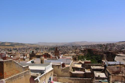 a view of a city from the top of a building at Dar Settash in Fès