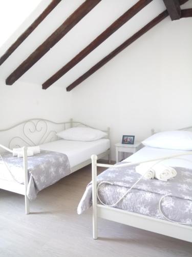 Katil atau katil-katil dalam bilik di Holiday Home Jadrić