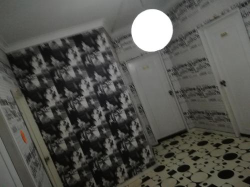 an empty room with two doors and a ceiling at Hotel Cristo Rei in Porto