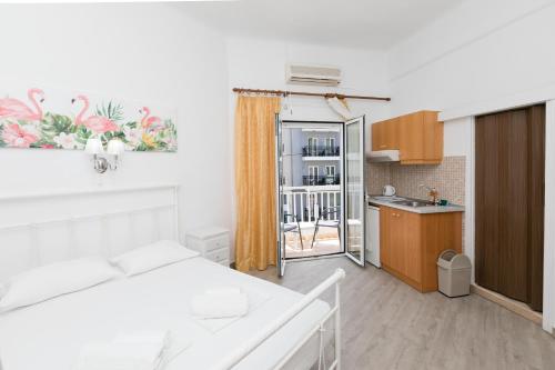 A kitchen or kitchenette at Kallithea Studios