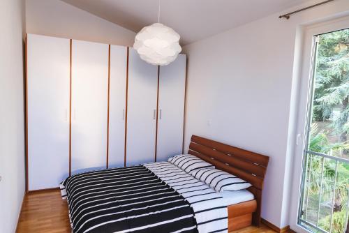 Postel nebo postele na pokoji v ubytování Apartma Joy - private beach