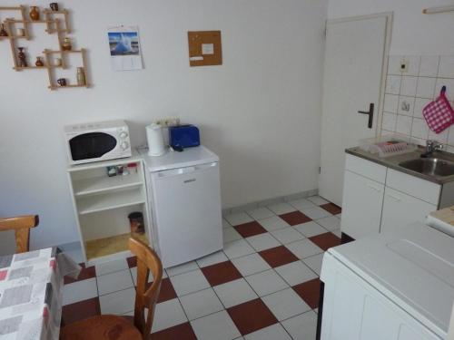 Kuchyň nebo kuchyňský kout v ubytování Schöne, gemütliche Wohnung