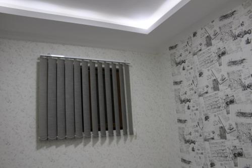 a radiator on a wall in a room at Villa Near The Batumi in Batumi