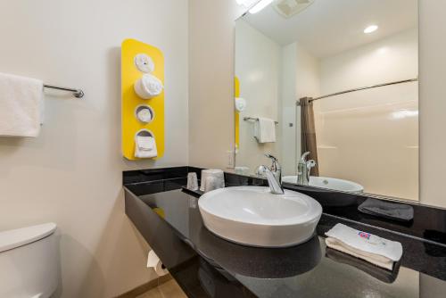 a bathroom with a sink and a toilet at Motel 6-Mankato, MN in Mankato