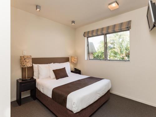 Postel nebo postele na pokoji v ubytování Sea Spray Suites - Heritage Collection