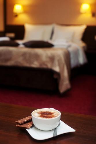 Ένα ή περισσότερα κρεβάτια σε δωμάτιο στο Hotel Wielopole