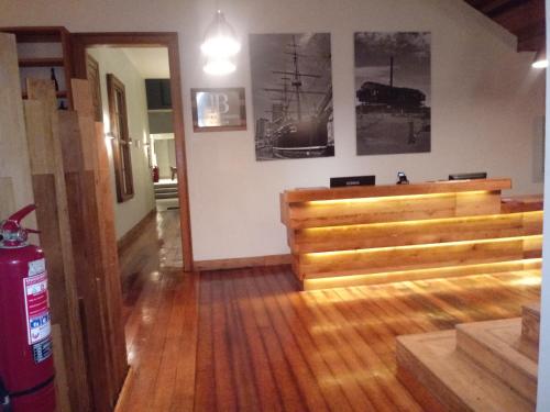 a room with a wooden pasteryasteryasteryasteryasteryasteryasteryasteryasteryastery at Hotel Baquedano Boulevard in Iquique