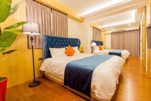 Кровать или кровати в номере Hliweng B&B