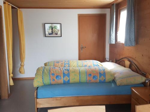Postel nebo postele na pokoji v ubytování Ferienstudio Familie Fässler-Dörig