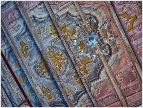 a ceiling of a building with a clock on it at VILLA VINICIA, pool, jacuzzi, airco in Domaso
