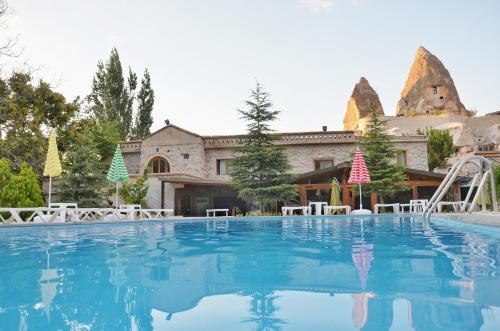 La alberca dentro o cerca de Kufe Hotel