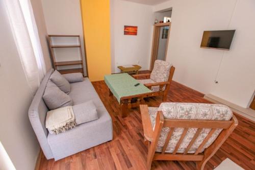 TV a/nebo společenská místnost v ubytování Apartments Alexa