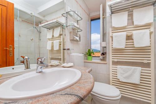 Koupelna v ubytování Hotel Ostrea
