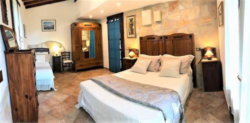 A bed or beds in a room at Villa Le Agavi & Spa