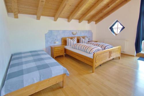 Postel nebo postele na pokoji v ubytování Haus Göhl