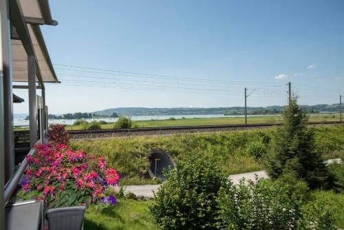 a view of the train tracks from a house at Gasthof Seefeld in Hurden
