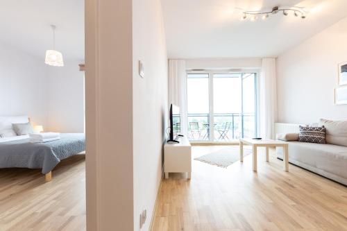 Postel nebo postele na pokoji v ubytování Baltic Apartments Main Town Towers