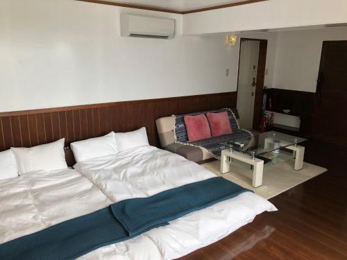 Ένα ή περισσότερα κρεβάτια σε δωμάτιο στο Ocean Villa Honey