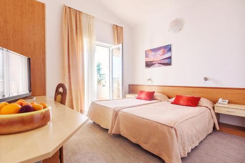 Postel nebo postele na pokoji v ubytování Villa Vicko