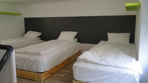 Postel nebo postele na pokoji v ubytování LazaApartman