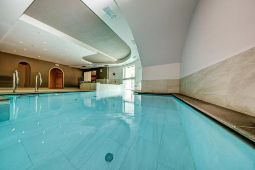 Πισίνα στο ή κοντά στο Aparthotel Wellness Villa di Bosco