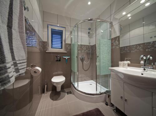 Ванна кімната в Apartments Lovely Croatia