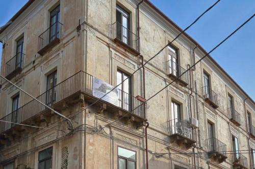 a building with balconies on the side of it at Marconi by PizzoApartments in Pizzo