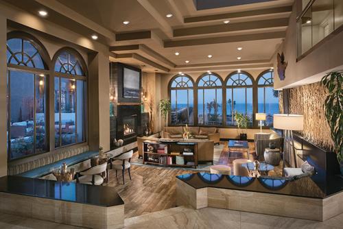 a large living room with a couch and a table at The Cliffs Hotel and Spa in Pismo Beach