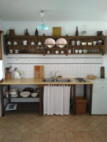a kitchen with a sink and a counter top at Penzion u sluníčka in Mikulov
