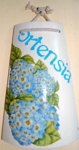 a picture of blue flowers with the word autism at Mariani Bed&Breakfast in Castellina in Chianti