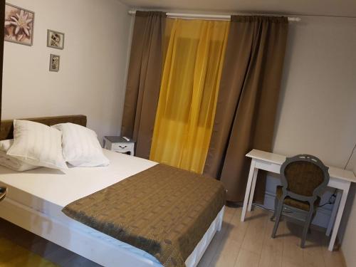 Ένα ή περισσότερα κρεβάτια σε δωμάτιο στο Alena