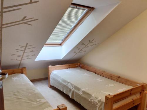 Postel nebo postele na pokoji v ubytování Pervalka Grand Appartment