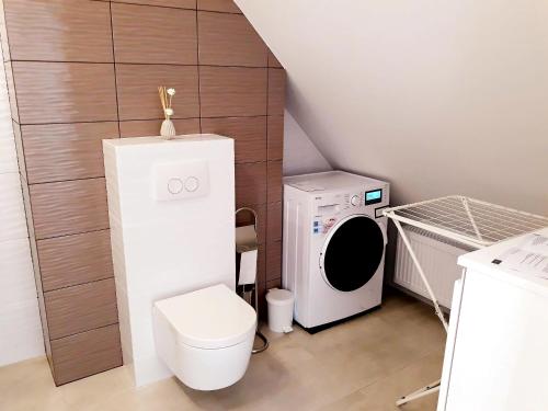 Phòng tắm tại Apartamenty przy Stoku Mrągowo