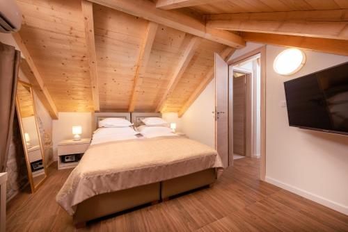 Ένα ή περισσότερα κρεβάτια σε δωμάτιο στο Hotel Agava Split