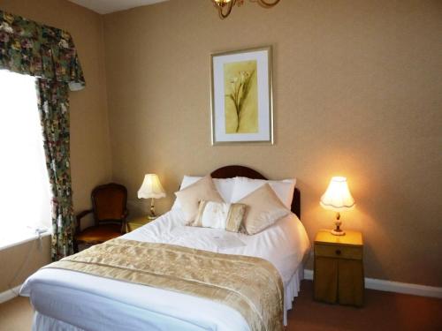 Postel nebo postele na pokoji v ubytování The Teesdale Hotel