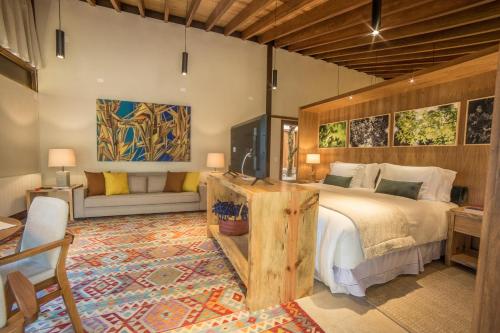 Postel nebo postele na pokoji v ubytování Hotel Toriba