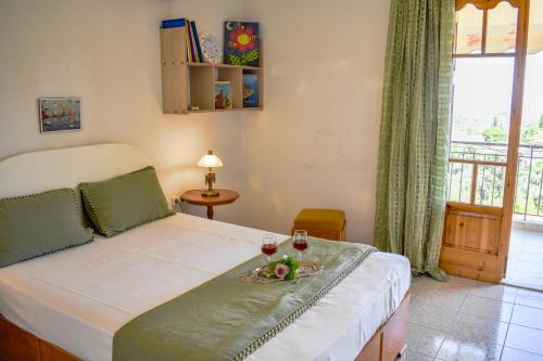 Katil atau katil-katil dalam bilik di Mayra Apartment