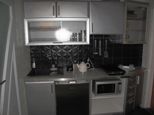 Kjøkken eller kjøkkenkrok på Apartament Mirror
