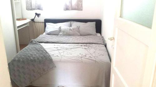 Llit o llits en una habitació de Blue Residence