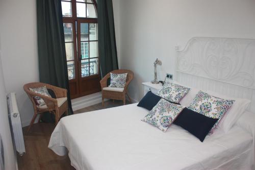 Postel nebo postele na pokoji v ubytování La Casa de Loli