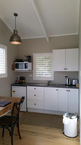 Η κουζίνα ή μικρή κουζίνα στο Mooring Lane Lodge