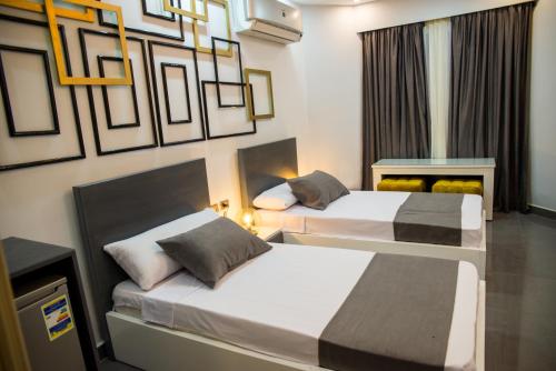 Een bed of bedden in een kamer bij Egyptian Night Hostel