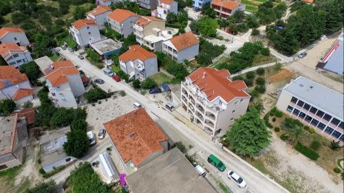 an overhead view of a city with buildings at Apartments Grozdana in Gradac