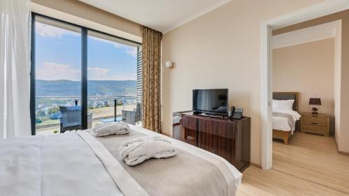 Postel nebo postele na pokoji v ubytování Lisi Hills Hotel